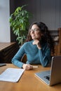 Confident lecturer or mentor business woman look in window after online class, lecture or training