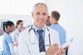 Confident male doctor smiling at camera Royalty Free Stock Photo