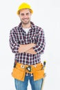 Confident male handyman wearing tool belt Royalty Free Stock Photo