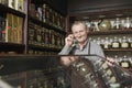 Confident Male Owner In Tea Shop Royalty Free Stock Photo