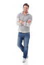 Confident man in jeans smiling