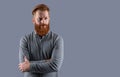 Confident man keeping arms crossed. Irish man with beard and moustache. Serious bearded man