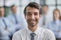 Confident man posing in front of his colleague during a meeting Royalty Free Stock Photo