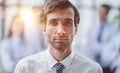 Confident man posing in front of his colleague during a meeting Royalty Free Stock Photo