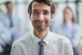 Confident man posing in front of his colleague during a meeting Royalty Free Stock Photo