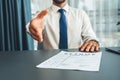 Confident man reach his hand for hand shake during job interview. Fervent