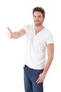 Confident man showing thumb up smiling