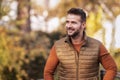 Confident man standign outside in the partk at autumn Royalty Free Stock Photo