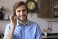 Confident man wearing headset speaking and watching business webinar training, listening to lecture Royalty Free Stock Photo