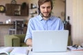 Confident man wearing headset speaking and watching business webinar training, listening to lecture Royalty Free Stock Photo