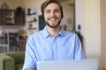 Confident man wearing headset speaking and watching business webinar training, listening to lecture Royalty Free Stock Photo