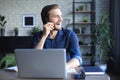 Confident man wearing headset speaking and watching business webinar training, listening to lecture Royalty Free Stock Photo