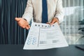 Confident man handing resume paper during job interview. Fervent Royalty Free Stock Photo