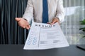 Confident man handing resume paper during job interview. Fervent Royalty Free Stock Photo