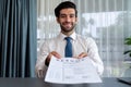 Confident man handing resume paper during job interview. Fervent Royalty Free Stock Photo