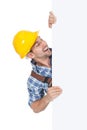 Confident manual worker holding billboard Royalty Free Stock Photo