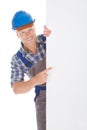 Confident manual worker holding billboard Royalty Free Stock Photo