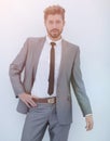 Serious businessman with hands on hips, isolated background Royalty Free Stock Photo