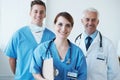 We are confident medical professionals. Portrait of three medical professionals smiling at the camera. Royalty Free Stock Photo