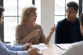 Confident middle aged businesswoman speaking at corporate meeting Royalty Free Stock Photo