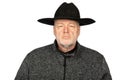 Confident Middle-Aged Caucasian Man in Black Cowboy Hat - Front View Portrait on White Background Royalty Free Stock Photo