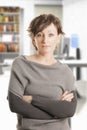 Confident middle aged woman in gray Royalty Free Stock Photo
