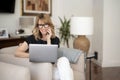 Confident middle aged woman working from home Royalty Free Stock Photo