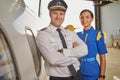 Friendly cabin crew members feeling happy to work together Royalty Free Stock Photo