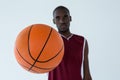 Confident player holding basketball Royalty Free Stock Photo