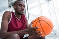 Confident player holding basketball Royalty Free Stock Photo