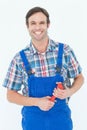 Confident plumber holding monkey wrench Royalty Free Stock Photo