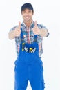 Confident plumber showing thumbs up sign