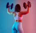 Dual toning blue red of young woman plus size doing fitness Royalty Free Stock Photo