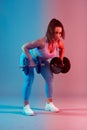 Dual toning blue red of young woman plus size doing fitness Royalty Free Stock Photo