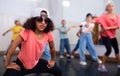 Preteen african american girl breakdancer posing in dance studio Royalty Free Stock Photo