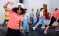 Preteen african american girl breakdancer posing in dance studio Royalty Free Stock Photo