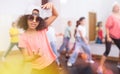 Confident preteen african american girl breakdancer in dance studio Royalty Free Stock Photo