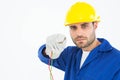 Confident repairman holding cables