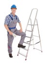 Confident repairman with ladder