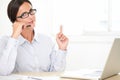 Confident secretary working on her desk Royalty Free Stock Photo