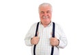 Confident senior man holding his suspenders
