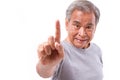 Confident senior man pointing up 1 finger, number 1 hand sign ge Royalty Free Stock Photo