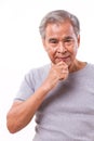 Confident senior man thinking, looking at you Royalty Free Stock Photo