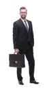 confident serious businessman with a leather briefcase. isolated on white Royalty Free Stock Photo