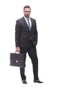 confident serious businessman with a leather briefcase. isolated on white Royalty Free Stock Photo