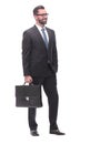 confident serious businessman with a leather briefcase. isolated on white Royalty Free Stock Photo