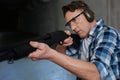 Confident skilled marksman concentrating on the activity Royalty Free Stock Photo