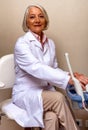 Confident smiling mature female doctor in hospital Royalty Free Stock Photo