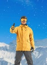 Confident snowboarder looking at camera Royalty Free Stock Photo