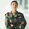 Confident soldier portrait, woman and arms crossed in army building, pride and professional hero service. Military